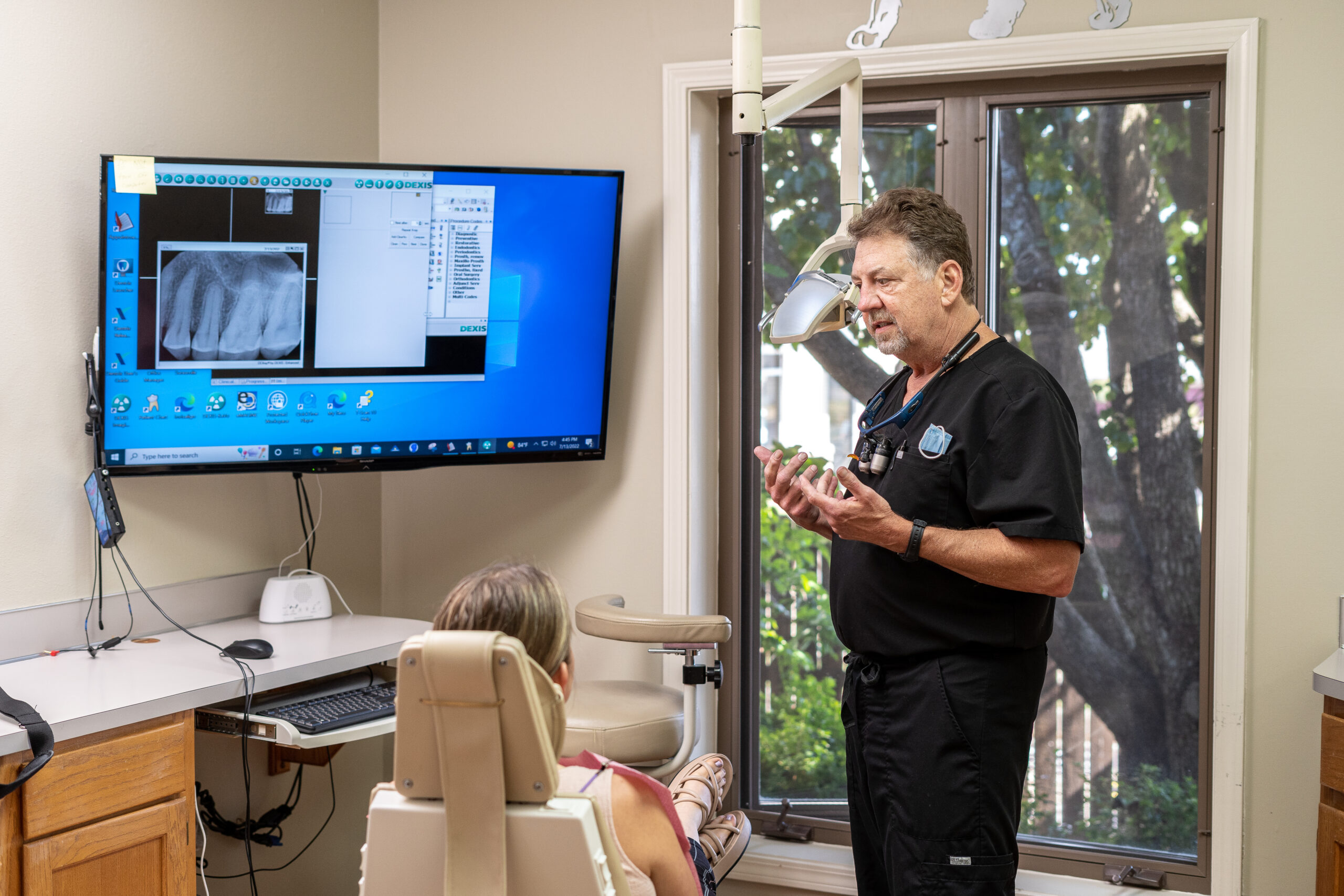 Dr. Wes discusses treatment options with a patient